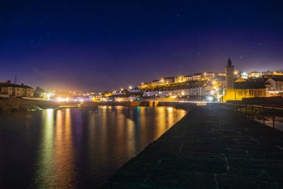 The Bright Lights of Porthleven Harbour at Night